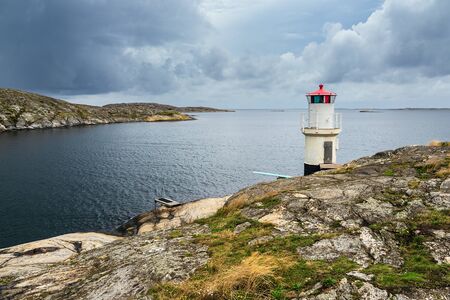 View to a lighthouse in Molloesund in Sweden.の写真素材