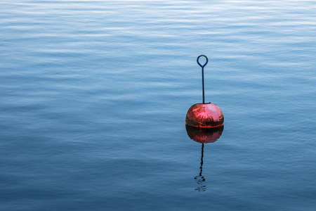 Buoy in the river Warnow in Rostock, Germany.の写真素材