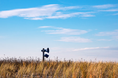 Dune grass and loudspeaker in Graal-Mueritz, Germany.の写真素材