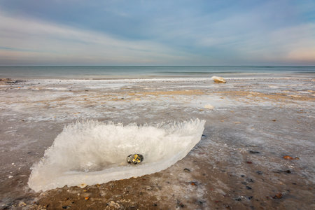 Broken ice in wintertime on the Baltic Sea coast near Kuehlungsborn, Germany.の写真素材