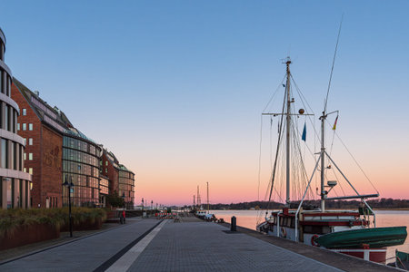 Morning time at the city harbor on the Warnow River in the hanseatic city of Rostock, Germany.の写真素材