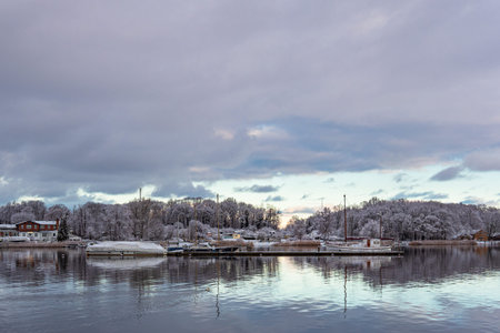 View over the Warnow in winter time to the Hanseatic city of Rostock, Germany.の写真素材