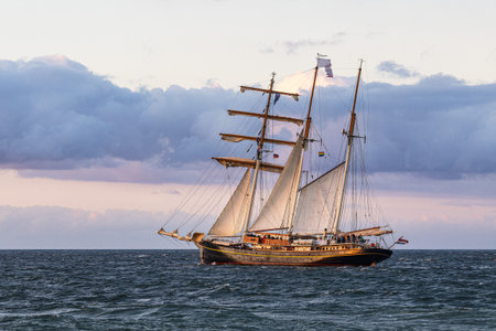 Sailing ship on the Baltic Sea in Warnemuende, Germany.の写真素材