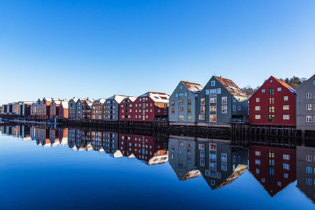 View of colorful houses on the river Nidelva in the city of Trondheim in Norway.の写真素材