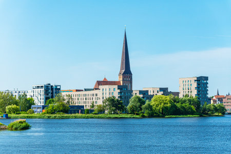 View over the river Warnow to the Hanseatic City of Rostock, Germany.の写真素材