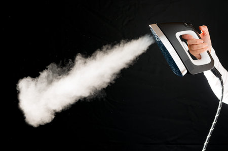 Iron with steam jet