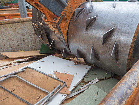 waste compactor in action in a container