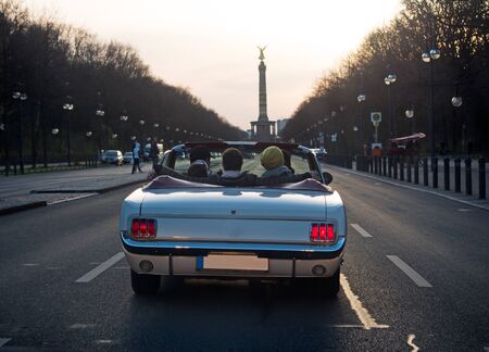 Convertible with young people in Berlin Germanyの写真素材