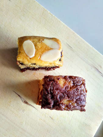 Homemade two brownie with nut and almond top viewの写真素材