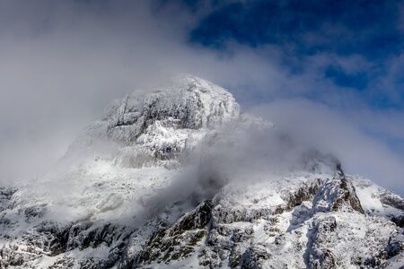 Summit in the mist of the clouds, Stunning landscape at Rila mountain in Bulgaria, Maliovica.の写真素材