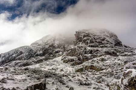 Winter landscape with dramatic sky at the Rial mountain in Bulgaria, Maliovica.の写真素材