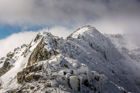 The road to the Maliovica summit in beautiful day with dramatic sky at Rila mountain in Bulgaria.の写真素材