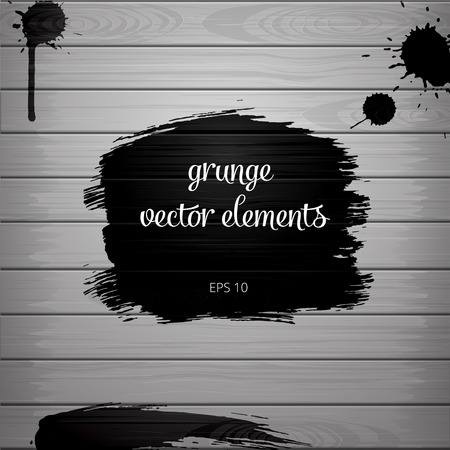 Black paintbrush on wooden plateのイラスト素材