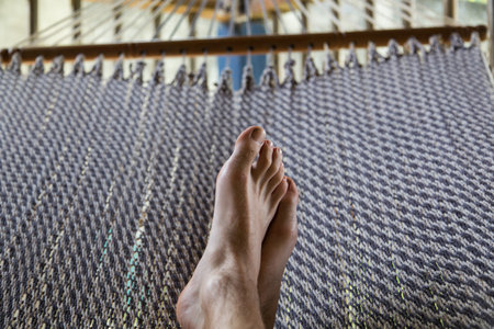 feet in hammockの写真素材