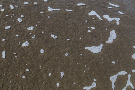 water from beach on sand