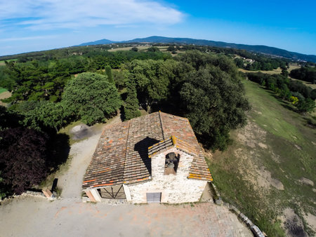 aerial view of small rural church in Cardedeu, Cataloniaの写真素材