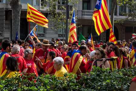 BARCELONA, SPAIN - SEPT. 11: People manifesting ingependence of Scotlandon and Catalonia at the strret of Barcelona during the National Day of Catalonia on Sept. 11, 2014 in Barcelona, Spain.のeditorial素材