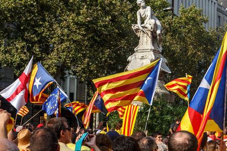 BARCELONA, SPAIN - SEPT. 11: People manifesting ingependence of Scotlandon and Catalonia at the strret of Barcelona during the National Day of Catalonia on Sept. 11, 2014 in Barcelona, Spain.のeditorial素材