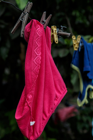 Hung Pink panties of a thread in Nicaraguan houseのeditorial素材