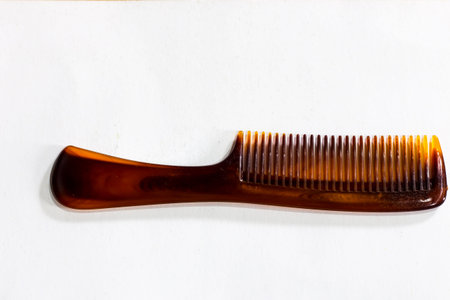 brown comb isolated on white background