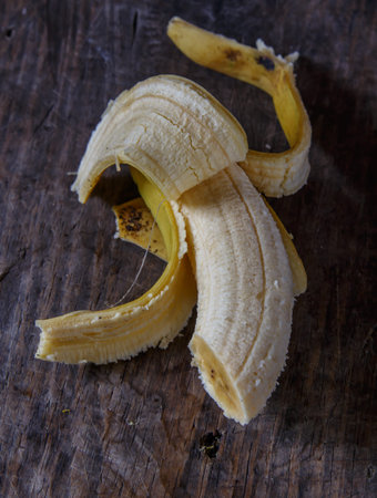 sliced banana on a wooden surfaceの写真素材