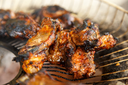 pork meat roasting on fire closeup