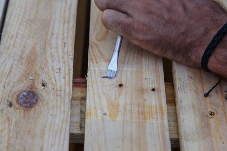 man hand working on wood with an Screwdriver -serial-の写真素材