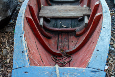 old wood boat in red, closeup detailの写真素材