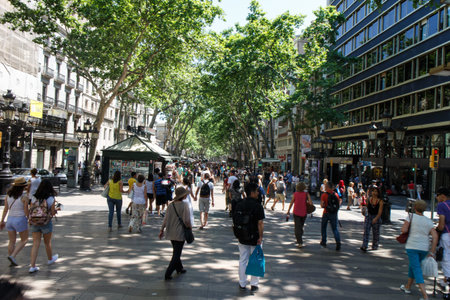 Barcelona, Catalunya- june 12th 2015: street view with people in Las Ramblas