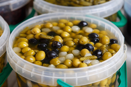 olives in conserve in a pot from marketplaceの写真素材