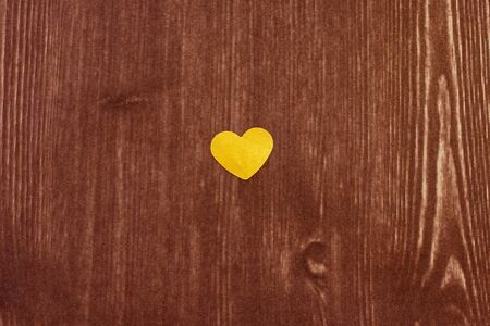 heart on wood textureの写真素材