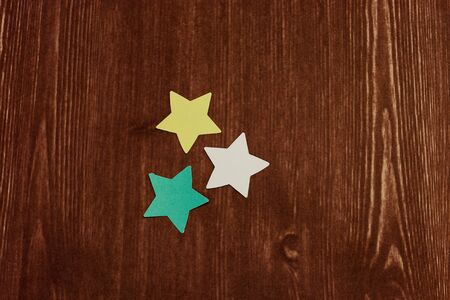 paper star on wood textureの写真素材