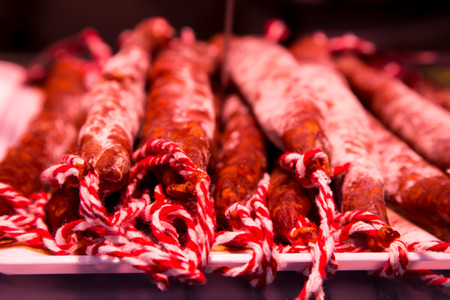 Catalan dry sausages called fuet at Mercat de Sant Josep de la Boqueria market in Barcelonaの写真素材