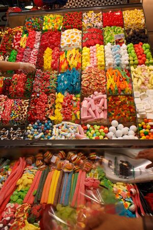 BARCELONA, SPAIN - JULY 15, 2015: colorful candy for sale at the Mercat de Sant Josep de la Boqueria in Barcelona. It is a large public market in the Ciutat Vella district of Barcelona.のeditorial素材