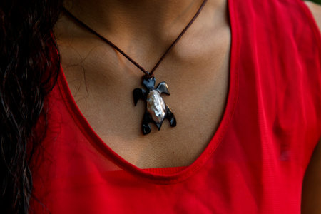 woman wearing a handmade Necklaceの写真素材