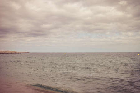 View of the sandy beach of the sea coast of Spainの写真素材