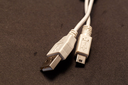 White cable of port usb detail in black background