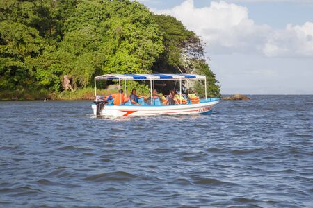 Granada, Nicaragua - December 23, 2015: Tourtist group on boat visiting the islands of granadaのeditorial素材