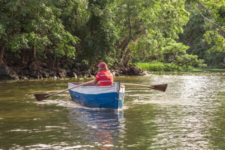 Granada, Nicaragua - December 23, 2015: man using a boat on river from Nicaraguaのeditorial素材
