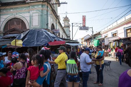 Granada, Nicaragua - December 22, 2015: street view with people across the marketのeditorial素材