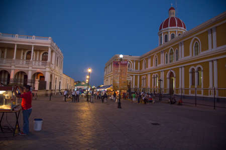 Granada, Nicaragua - February 18, 2016:  Central park view with tourists during international festival of poesy in Granada.のeditorial素材