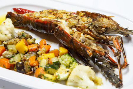 gourmet Lobster served with vegetablesの写真素材