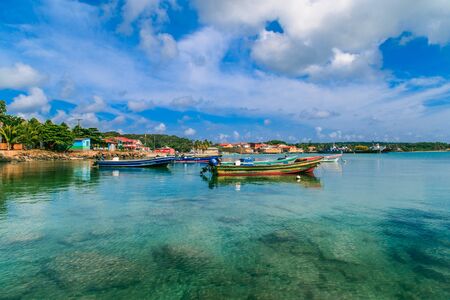 Corn Island, Nicaragua - April 21, 2016: view of corn island Nicaragua. sea with boats and blue skyのeditorial素材