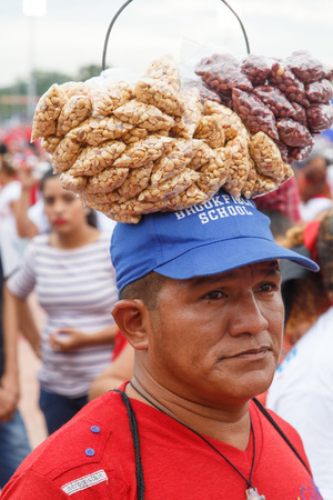 Managua, Nicaragua July 19, 2016: man selling food on streetのeditorial素材
