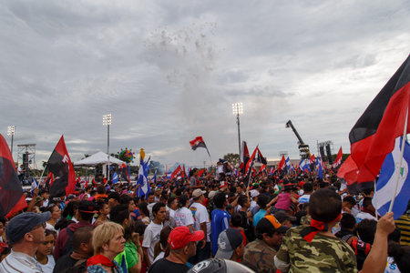 Managua, Nicaragua â€“ July 19, 2016: People on street commemorating the 37th anniversary of...