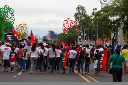 Managua, Nicaragua â July 19, 2016: People on street commemorating the 37th anniversary of victory of sandinist revolutionのeditorial素材