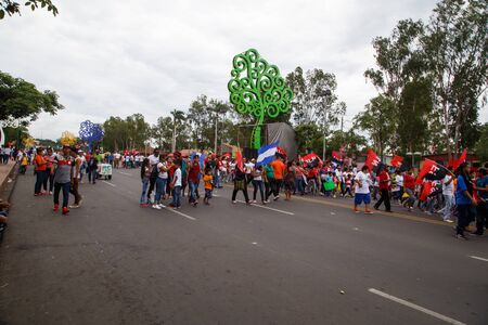 Managua, Nicaragua â July 19, 2016: People on street commemorating the 37th anniversary of victory of sandinist revolutionのeditorial素材