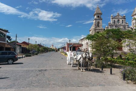 Granada, Nicaragua â December 21, 2016: Guadalupe Church view with la Calzada, the most touristic street in Nicaraguaのeditorial素材