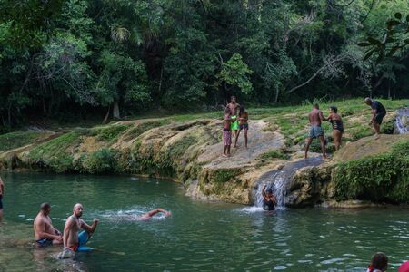 Las Terrazas, Cuba â December 28, 2016: tourist relaxing on natural pool in rio san juan , las terrazas pinar del rioのeditorial素材
