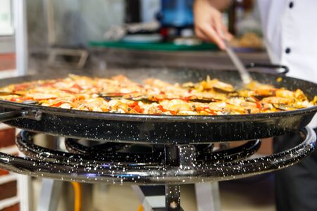 Cooking seafood paella typical spanish food.の写真素材